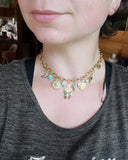 Collier l’éveil du lotus, acier inoxydable et calcite verte